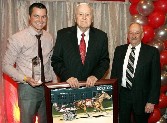 Driver Ronnie Wrenn (left), owner/breeder Keith Ross (middle) and trainer and sometimes driver Don McKirgan celebrated Like Old Times being named the 2015 Ohio Horse of the Year | Brad Conrad