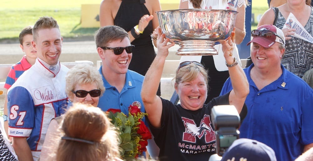 Paula Wellwood was euphoric to finally win the Hambletonian and do it with (from left) driver Scott Zeron, her mother Jean, son Devin and husband, Mike Keeling | Dave Landry
