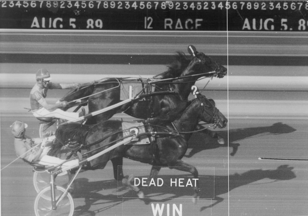 When Frank M. Antonacci had the win photo from the 1989 dead-heat Hambletonian digitally enlarged, he discovered that his family’s horse Probe (2, Bill Fahy) appears to have won the race outright over Park Avenue Joe (Ron Waples).