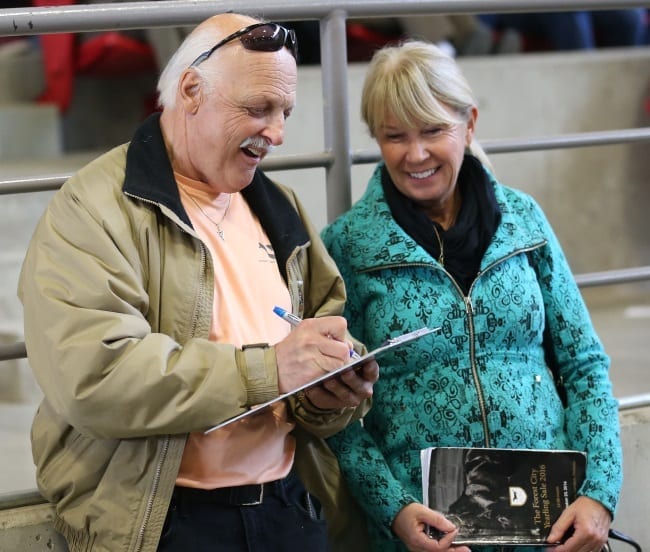 Dr. Ian Moore (with his wife, Nancy) signed for the $110,000 sale topper Percy Bluechip, a full-sister to Arthur Blue Chip. | Claus Andersen