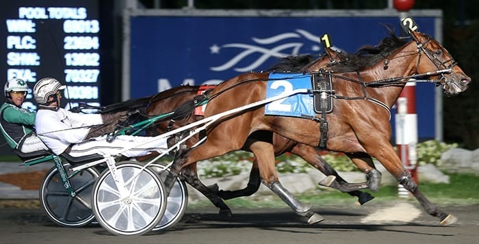 Bee A Magician and Brian Sears beating the boys in the 2015 Maple Leaf Trot at Mohawk. | New Image Media