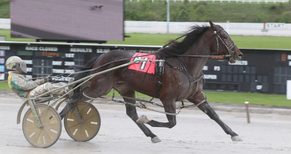 Huntsville (Tim Tetrick) won by 10 lengths in 1:50.3 in the slop | Chris Gooden