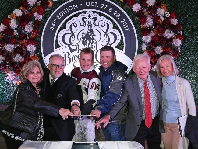 Some of Stay Hungry's winning connections, including: part-owner Brad Grant (second from left), driver Doug McNair (third from left) and trainer Tony Alagna (fourth from left) | Claus Andersen